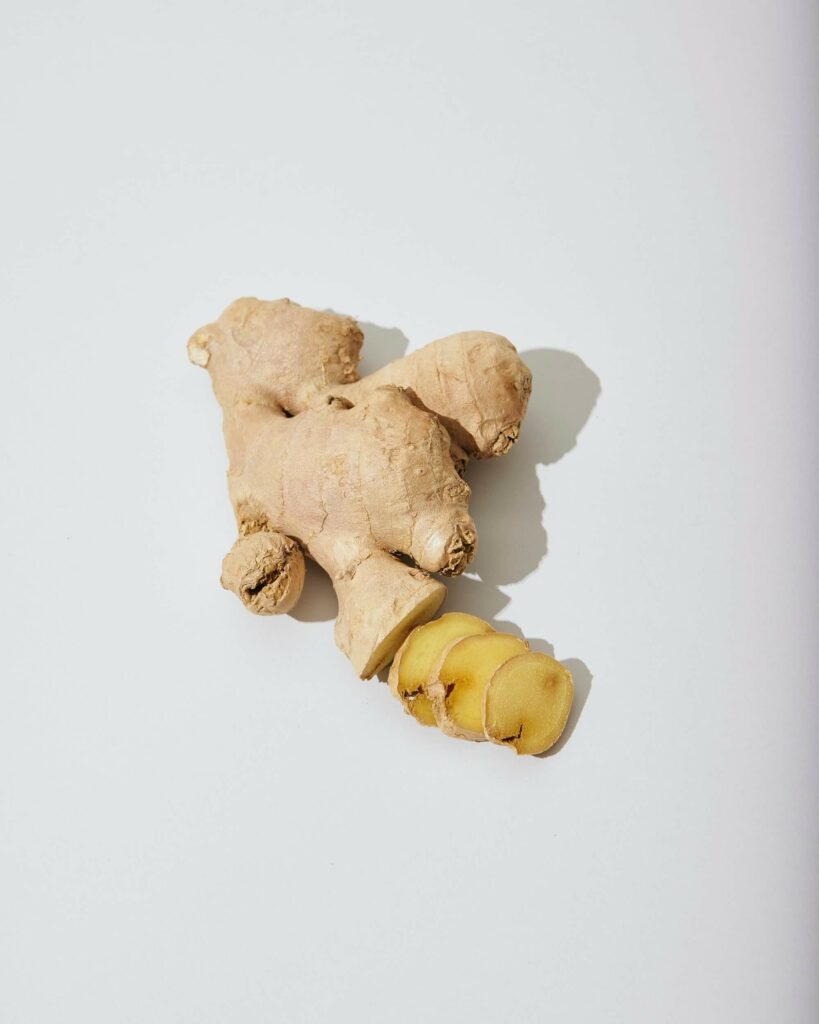Ginger root on grey background as example of hyperemesis gravidarum treatment